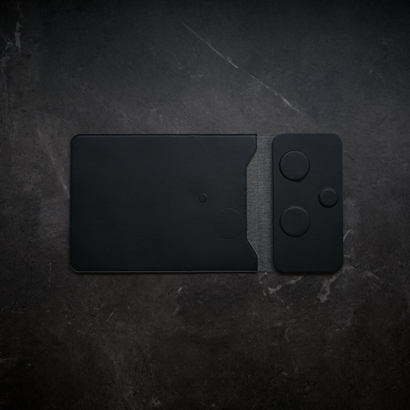 NODE. Minimalist Black Laptop Sleeve with Apple Magsafe compatible charging docks for iPhone, Airpods and Apple Watch.