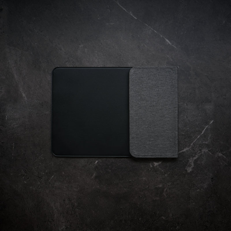 NODE. Minimalist Black Laptop Sleeve with Apple Magsafe compatible charging docks for iPhone, Airpods and Apple Watch.